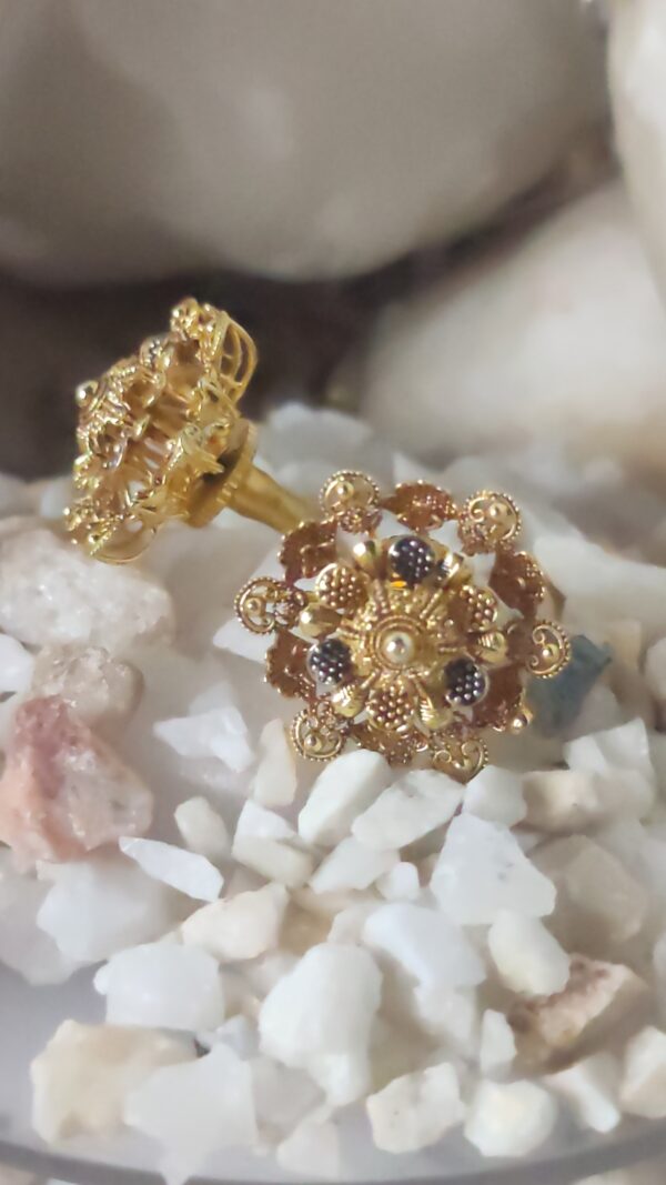 Antique Gold-Plated Floral Stud Earrings with Black Stone Detailing – Traditional Ethnic Design