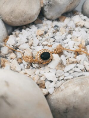 Handcrafted Gold-Plated Charm Bracelet with Traditional Detailing – Festive Jewelry