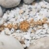 Gold-Plated Chain Bracelet with Delicate Floral Charm – Elegant Ethnic Design
